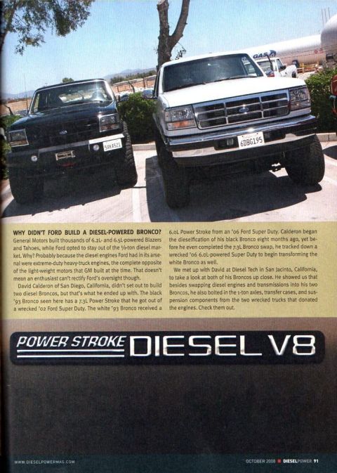 1985 Ford Bronco - Two Ford Broncos are parked side-by-side in a parking lot under a tree. The Bronco on the left is black and the Bronco on the right is whit…