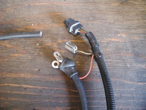 1985 Ford Bronco - I had the Taurus wiring harness, which got me the plug and the boot for the charge cable.