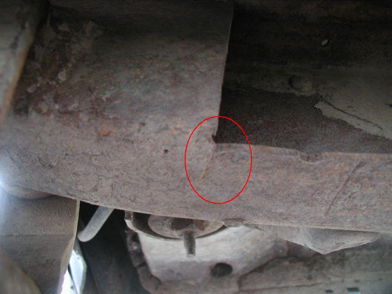 One crack behind the shackle mount.