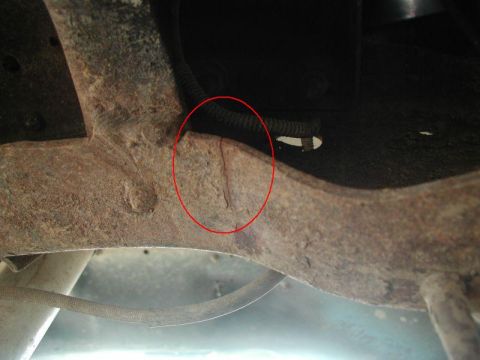 1985 Ford Bronco - One crack behind the crossmember.