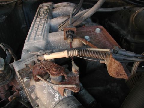 1985 Ford Bronco - I ended up getting the shifter cable for a tandem bike. I ran the cable along side the accelerator cable, then through the plastic piece on…