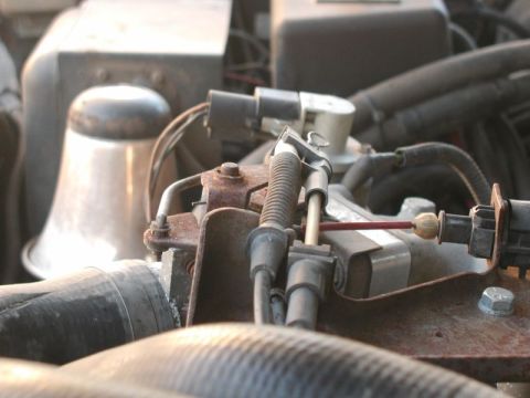 1985 Ford Bronco - I ended up getting the shifter cable for a tandem bike. I ran the cable along side the accelerator cable, then through the plastic piece on…