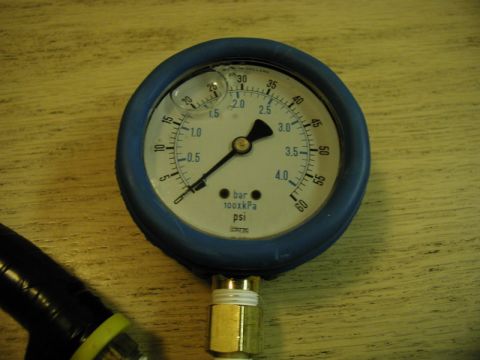 1985 Ford Bronco - ? 0-60 psi, liquid filled, with a Moroso #89590 Gauge Cover.