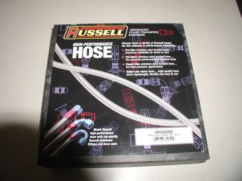 1985 Ford Bronco - A box of Russell High-Performance Hose is shown. The box has a black background with red and blue accents and features images of hose fitti…