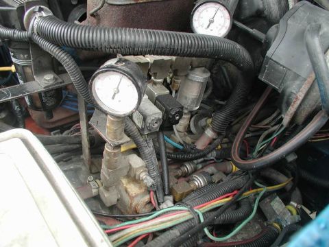 1985 Ford Bronco - Underhood gauge's: left for OBA, right for ARB's.