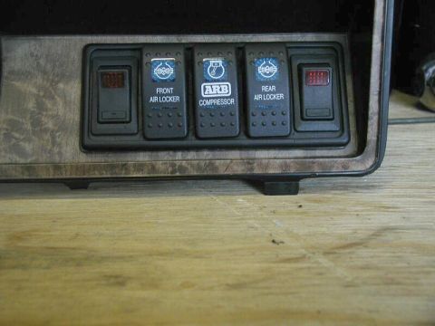 1985 Ford Bronco - From left to right - 110 psi or 150 psi pressure switch - front ARB on/off - master OBA system on/off - rear ARB on/off - drain solenoid on…