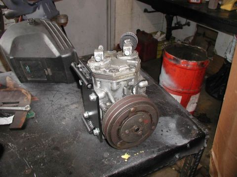 1985 Ford Bronco - Bracket mounted to compressor.