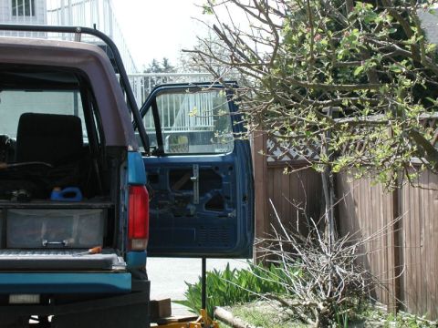 1985 Ford Bronco - The "new" door installed. This door is from an '88-'91 F250, so I had to swap a few parts over. I'm not sure if the interior panel will fit…