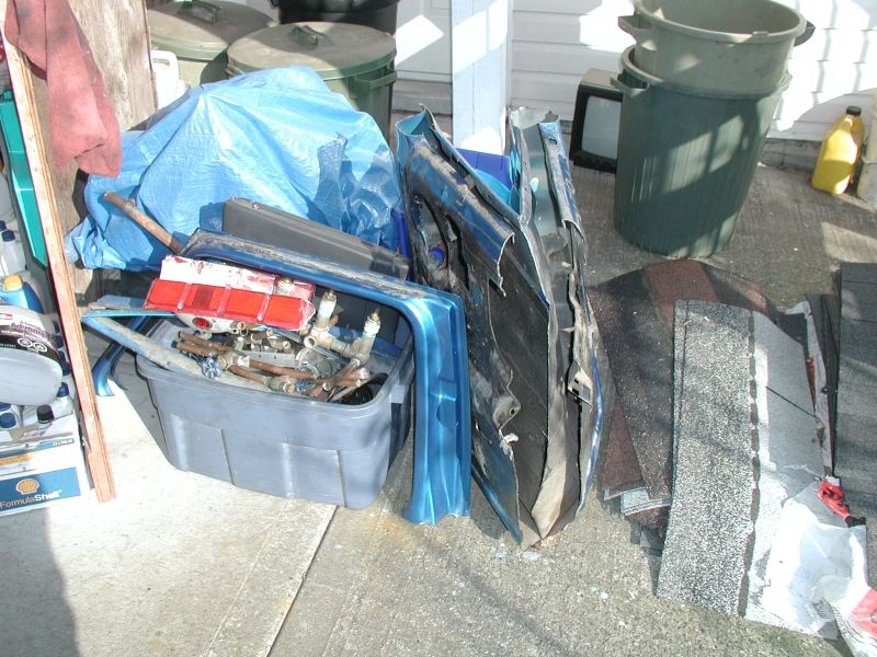 The old door ready for the scrap pile.