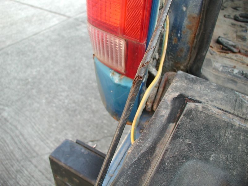 The left one is hanging on by a few strands.