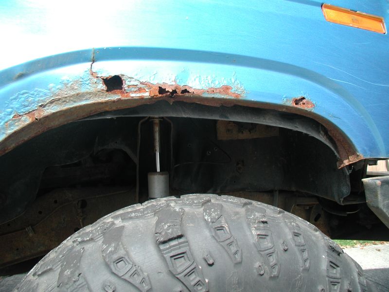 Because the fender lip is rotten, the whole inner fender is dropping.