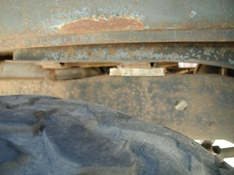 1985 Ford Bronco - I jacked the body up enough to get a piece of wood under this crossmember to take some weight off the right rear body mounts while I was wo…