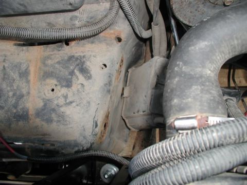 1985 Ford Bronco - Then I removed what was left of the factory battery tray and the bracket that supports the charcoal canister; this gives me the room I need…