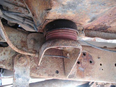 1985 Ford Bronco - The two front cab mounts with the Super Duty rubbers in place; with full weight on them, they compressed to 1 15/16". I had to trim the bot…