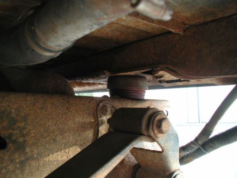 1985 Ford Bronco - The two rear cab mounts with the Super Duty rubbers in place; with full weight on them, they compressed to 1 15/16". I had to trim the bott…