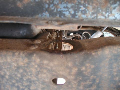 1985 Ford Bronco - This is on the right side, second from the rear. The hole is supposed to be around 1 1/2", but it is closer to 1 3/4". There is a small cra…