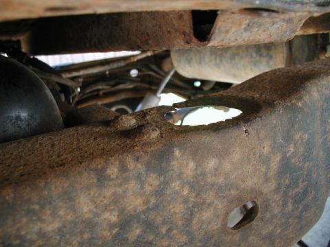 1985 Ford Bronco - This is on the right side, second from the rear. The hole is supposed to be around 1 1/2", but it is closer to 1 3/4". There is a small cra…