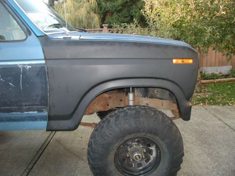 1985 Ford Bronco - Front fender bolted into place.