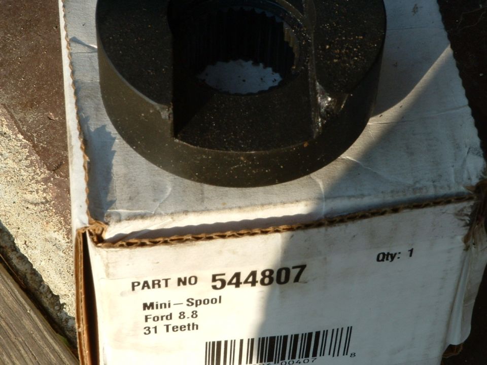 Mini-spool locker for Ford 8.8 31-spline axle on its labeled part box