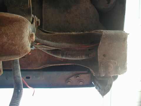 1985 Ford Bronco - Left side, looking straight up (shackle to the left).
