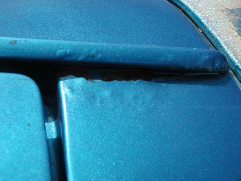 1985 Ford Bronco - Drivers side, rear of rain gutter.