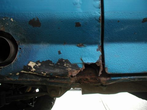 1985 Ford Bronco - Passenger side, bottom of B pillar.