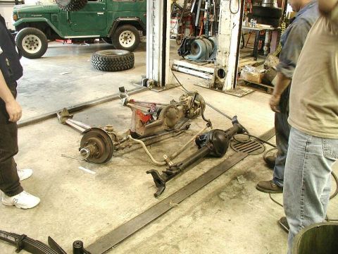 1985 Ford Bronco - The TTB out and the straight D44 waiting to go in.
