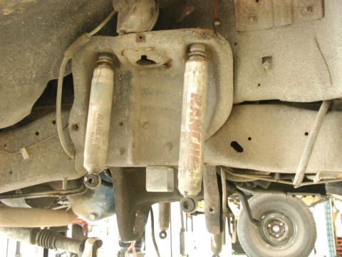 1985 Ford Bronco - Both coil buckets will have to be removed.