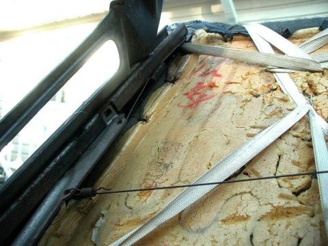 1985 Ford Bronco - Close up of drivers seat - left side linkage.