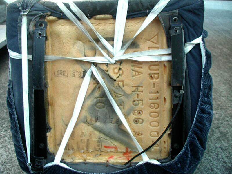 Close up of passenger seat. Note the cable which is part of the tilt mechanism.