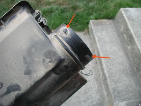 1985 Ford Bronco - First I removed the airbox. Then I ground off the three short tabs that the factory hose "locked" onto.