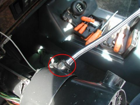 1985 Ford Bronco - Drive out the roll pin and remove the shift lever and rubber boot. Unscrew and remove the turn signal lever.