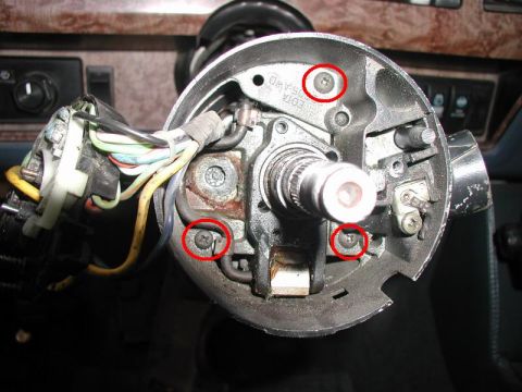 1985 Ford Bronco - Undo the three screws and slide off the upper cover.