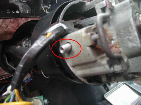 1985 Ford Bronco - Remove the two pivot pins.
