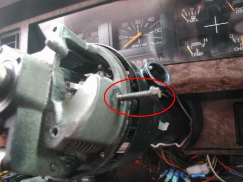 1985 Ford Bronco - Thread a screw into the pin; when the pin starts to rotate, lightly pull it out.