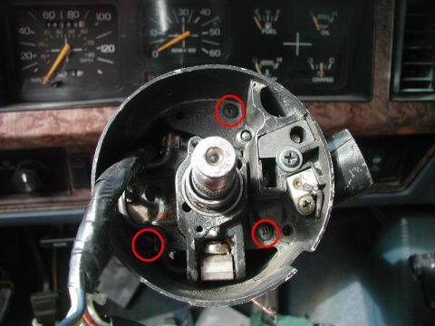 1985 Ford Bronco - Put on some loctite and thread in the three upper cover screws.