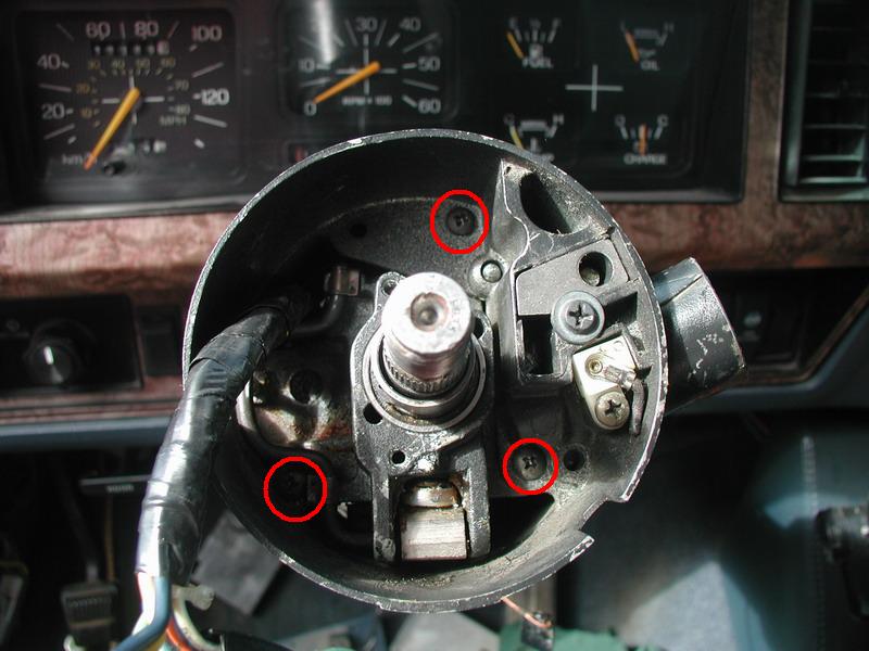 Put on some loctite and thread in the three upper cover screws.
