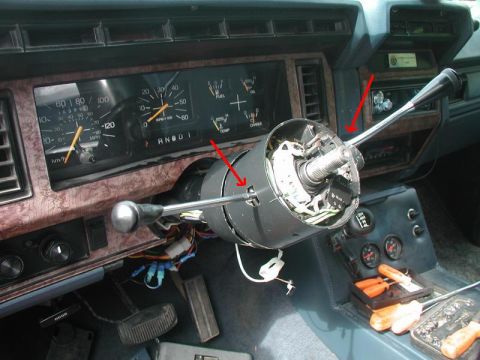 1985 Ford Bronco - Re-install the transmission and signal lever's.