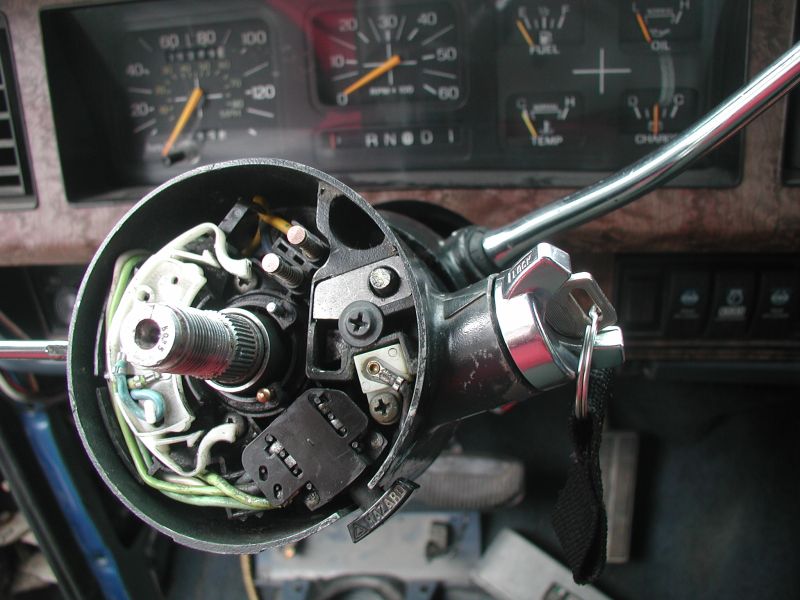 Slide the cylinder in and turn it to "off" to lock it into place.