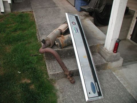 1985 Ford Bronco - Got in a few hours after work to get a few more parts removed: tailgate trim panel, exhaust and OBA tank.