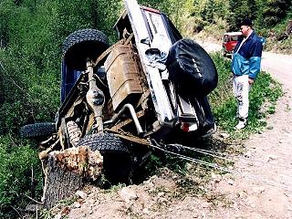 1985 Ford Bronco - That's me sulking, can't believe what I have done. (note the stump that I hit)