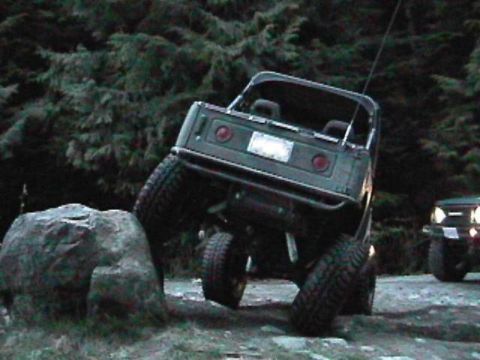1985 Ford Bronco - Jay climbs the big rock.