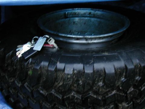 1985 Ford Bronco - Got a gash in the right rear tire.