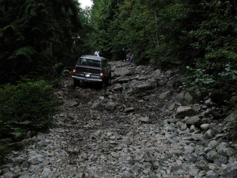 1985 Ford Bronco - Dave climbs his way up this challenging part of the trail.