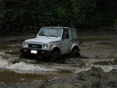 1985 Ford Bronco - Pete playing in the mud puddle.