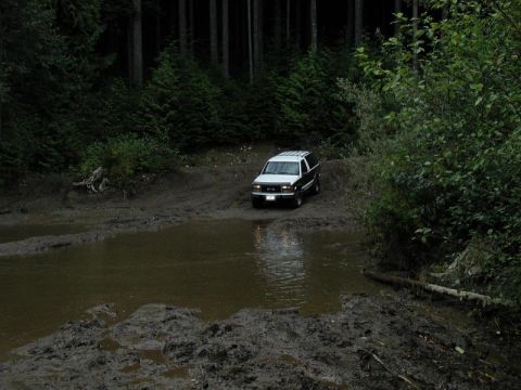 1985 Ford Bronco - Jarrod going into the mud puddle.