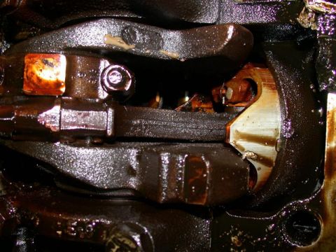 1985 Ford Bronco - This is the cracked piston with the bent rod.