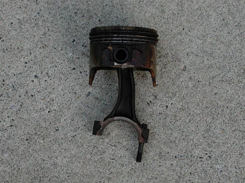 Here is a better shot. Note the curve in the connecting rod.