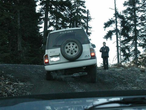 1985 Ford Bronco - Chris F had to fight a little to get through this cross ditch. Nice flex for a stock truck.