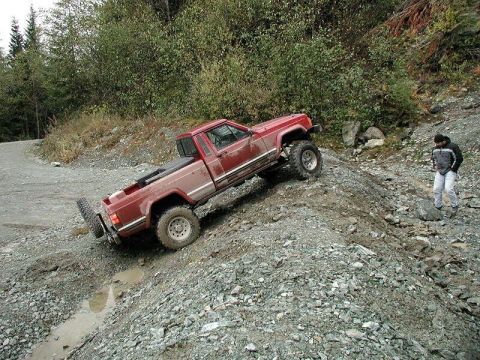 1985 Ford Bronco - Doug climbs up again.